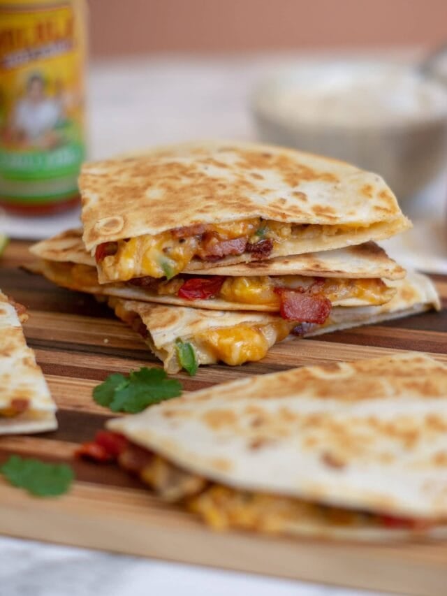A front-on picture of a stack of simple breakfast quesadillas