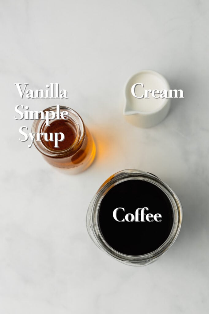 https://midwestniceblog.com/wp-content/uploads/2022/06/Vanilla-Iced-Coffee-Ingredients-682x1024.jpg