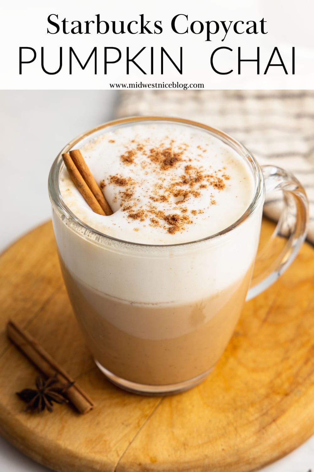 A pin to share the recipe for pumpkin chai lattes showing a clear glass mug full of the drink.