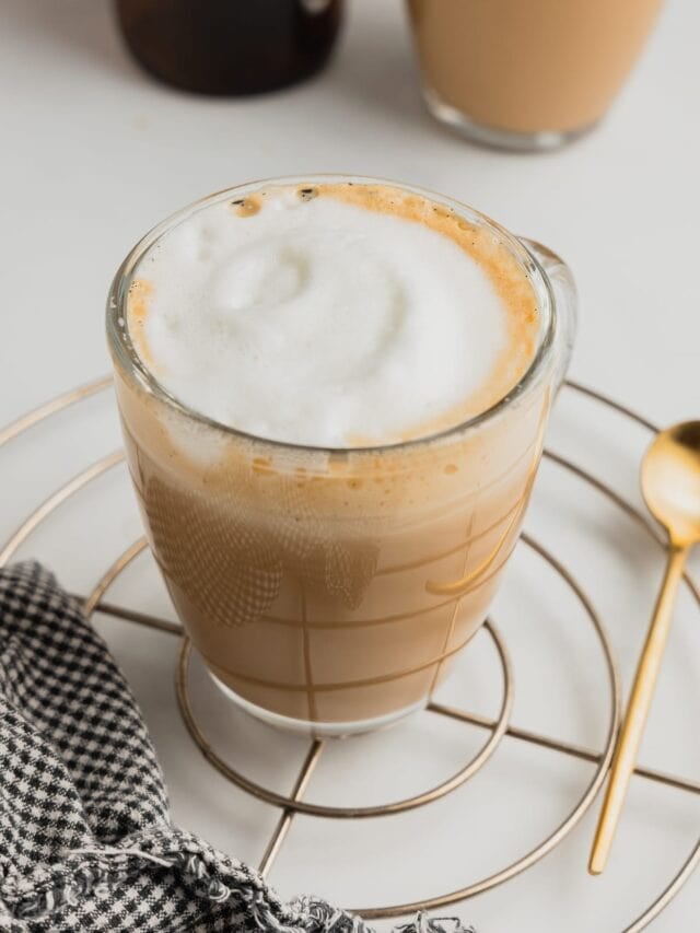 An overhead view of the steamed milk on top of a vanilla latte.